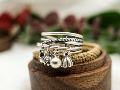 Sterling Silver Lotus Tassel Ring: Adjustable Crossover Band